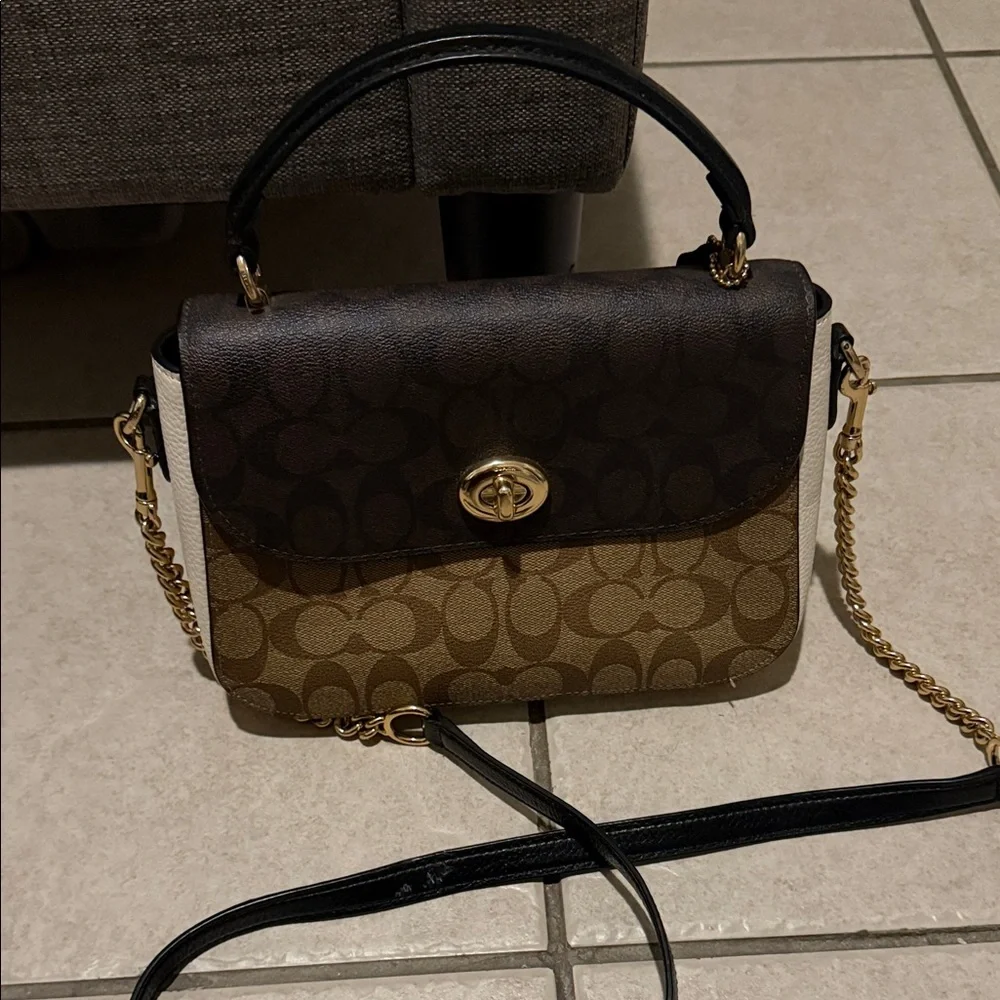 Coach Two-Tone Signature Turnlock Crossbody Bag in Brown and Black